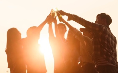 Six young entrepreneur gathering together toast for success in business start up, group party at dusk, cropped dimension for banner